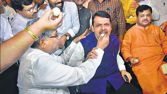 BJP leader Devendra Fadnavis along with other party leaders celebrates after CM Uddhav Thackeray resigns from his post, in Mumbai, India, on Wednesday, June 29, 2022. (Photo by Bhushan Koyande/HT Photo)