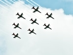 Suryakiran Aerobatic Team of the Indian Air Force conducts a fly-past at the Combined Graduation Parade, Air Force Academy in Dundigal (ANI Photo)