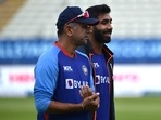 Jasprit Bumrah (right) and coach Rahul Dravid inspect the pitch during a training session ahead of the 5th Test against England at Edgbaston(AP) Jasprit Bumrah (right) and coach Rahul Dravid inspect the pitch during a training session ahead of the 5th Test against England at Edgbaston(AP)