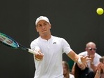Norway's Casper Ruud plays a return to France's Ugo Humbert in a second round men's singles match on day three of the Wimbledon tennis championships in London, Wednesday June 29, 2022. Norway's Casper Ruud plays a return to France's Ugo Humbert in a second round men's singles match on day three of the Wimbledon tennis championships in London, Wednesday June 29, 2022.