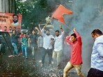 Shiv Sena workers burn firecrackers to celebrate the announcement of Eknath Shinde's name as the next chief minister of Maharashtra, in Thane, Thursday, June 30, 2022. (PTI Photo)