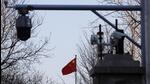 A Chinese flag is seen near surveillance cameras outside the Beijing No. 2 Intermediate People's Court in Beijing, China, on March 31, 2022. (REUTERS/FILE)