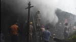 Fire brigade personnel try to douse the fire at Hathua market in Patna on Thursday. (HT Photo/ Santosh Kumar) Fire brigade personnel try to douse the fire at Hathua market in Patna on Thursday. (HT Photo/ Santosh Kumar)