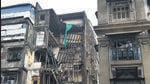 A portion of a vacated ground-plus-four storey building collapses while repair work was underway at Badam Wadi, Kalbadevi, in Mumbai on Thursday. (Bhushan Koyande/HT Photo) A portion of a vacated ground-plus-four storey building collapses while repair work was underway at Badam Wadi, Kalbadevi, in Mumbai on Thursday. (Bhushan Koyande/HT Photo)