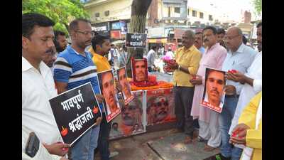 BJP workers paying tribute to Udaipur tailor Kanhaiya Lal in Varanasi. (ht photo) BJP workers paying tribute to Udaipur tailor Kanhaiya Lal in Varanasi. (ht photo)
