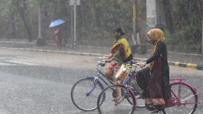 Gurugram, India - June 30, 2022: Cyclist in the rain at Galleria Market in Gurugram, India, on Thursday, June 30, 2022. (Photo by Vipin Kumar/ Hindustan Times) (Hindustan Times) Gurugram, India - June 30, 2022: Cyclist in the rain at Galleria Market in Gurugram, India, on Thursday, June 30, 2022. (Photo by Vipin Kumar/ Hindustan Times) (Hindustan Times)