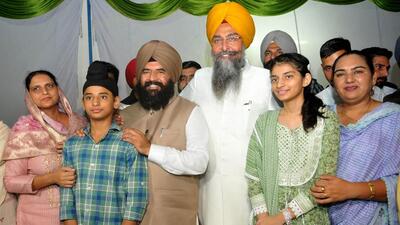 Newly elected deputy speaker Jaikishan Singh Rori (brown turban) with his family and speaker Kultar Singh Sandhwan at the Punjab Vidhan Sabha in Chandigarh on Thursday. (Ravi Kumar/HT)