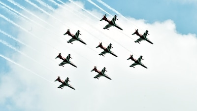 Suryakiran Aerobatic Team of the Indian Air Force conducts a fly-past at the Combined Graduation Parade, Air Force Academy in Dundigal (ANI Photo) (Mohammed Aleemuddin )
