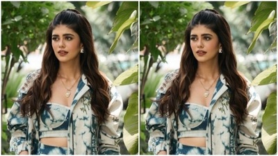 Sanjana decked up in a cropped top that came in blue and white tie and dye prints and featured corset style details. She paired it with a high waisted skirt that cascaded till her knees. The skirt also featured the same print. (Instagram/@sanjanasanghi96)