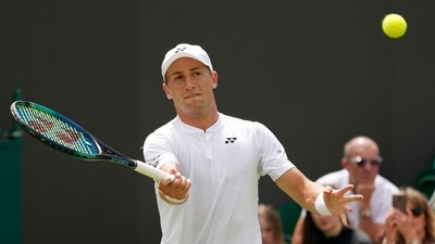 Norway's Casper Ruud plays a return to France's Ugo Humbert in a second round men's singles match on day three of the Wimbledon tennis championships in London, Wednesday June 29, 2022. (AP) Norway's Casper Ruud plays a return to France's Ugo Humbert in a second round men's singles match on day three of the Wimbledon tennis championships in London, Wednesday June 29, 2022. (AP)