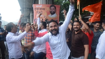 Supporters celebrate after Eknath Shinde was anointed the chief minister of Maharashtra (( Praful Gangurde / HT Photo))