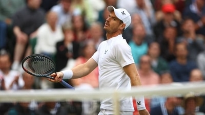 Wimbledon: Britain's Andy Murray reacts during his second round match against John Isner of the U.S. (REUTERS)