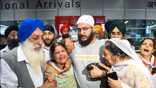 Family members of Sawinder Singh, who was killed in the Kabul gurdwara attack, break down after receiving his ashes at the IGI Airport in New Delhi on Thursday. (ANI Photo)