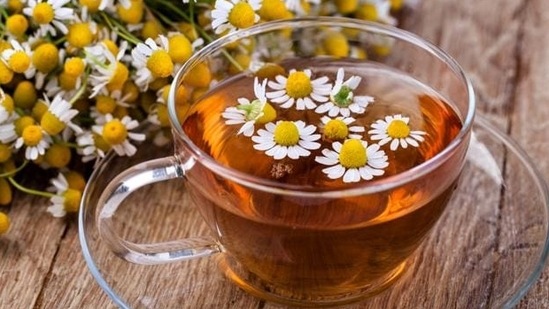 Chamomile Tea: This one’s a complete superstar. All you need is some warm water, a cup and a chamomile tea bag on days you don’t feel like turning in. Chamomile tea is a storehouse of apigenin, an antioxidant that binds to receptors in the brain that promotes sleepiness.&nbsp;(Shutterstock)