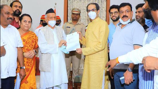 Maharashtra chief minister Uddhav Thackeray submitting his resignation to Governor Bhagat Singh Koshyari in Mumbai on Wednesday night. (Twitter Photo)