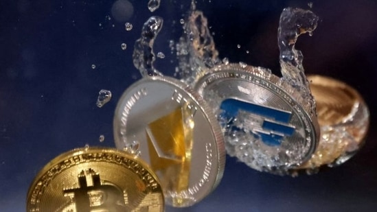 FILE PHOTO: Representations of cryptocurrency Bitcoin, Ethereum and Dash plunge into water in this illustration(REUTERS)
