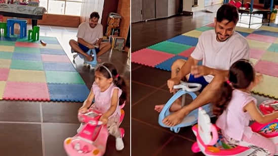 Inaaya Naumi Kemmu tricycles with dad Kunal Kemmu.