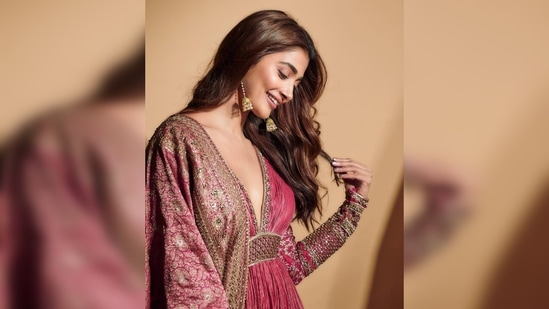 Pooja Hegde's anarkali featured a plunging neckline and intricate sequins work on textured material.(Instagram/@hegdepooja)