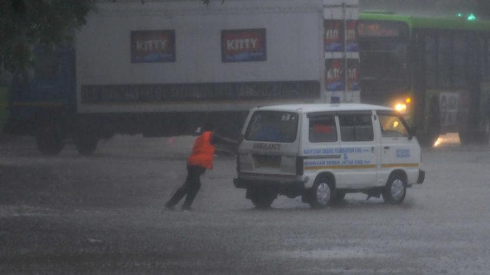 An ambulance caught in the downpour in Chandigarh on Thursday morning. (Keshav Singh/HT) An ambulance caught in the downpour in Chandigarh on Thursday morning. (Keshav Singh/HT)