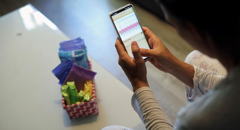 Your body, your period... your data? New apps are trying to move people away from commercial period trackers that sell your data for advertising (Isabel Infantes/REUTERS)