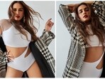 It's Huma Qureshi's birthday month and the actor just cannot keep calm. The Gangs pf Wasseypur started the month by sharing some uber stylish photos of herself in a white cut-out babysuit which she teamed with a checkered jacket.(Instagram/@iamhumaq)