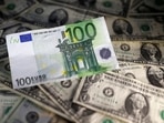 FILE PHOTO: U.S. dollar and Euro notes are seen in this November 7, 2016 picture illustration.. REUTERS/Dado Ruvic/Illustration