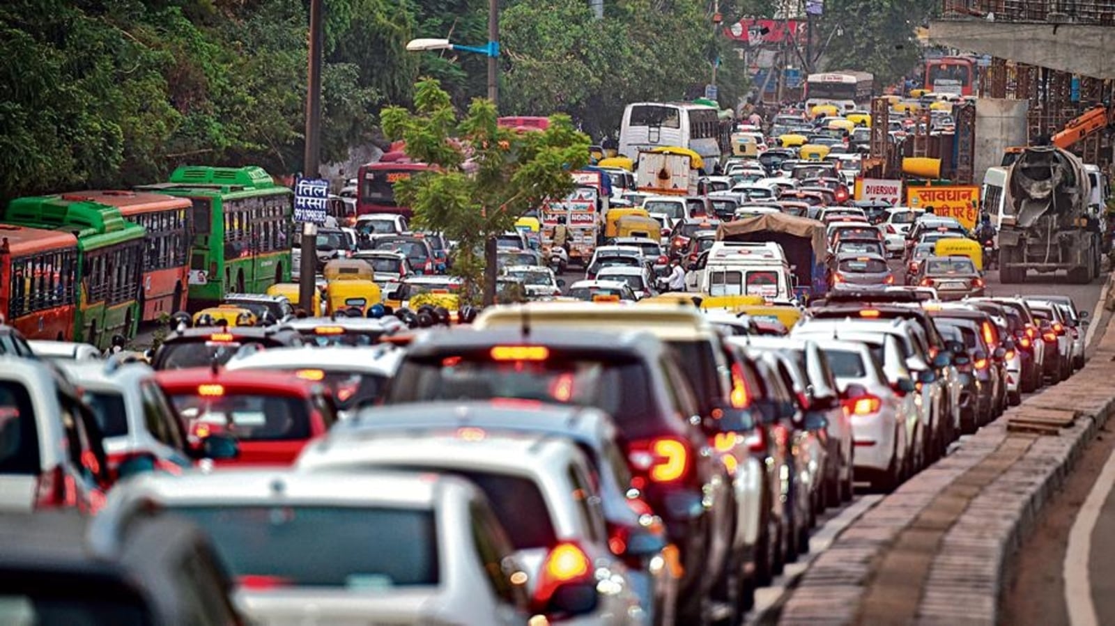 Delhi rain: Traffic glacial as impact of rain spills on to streets