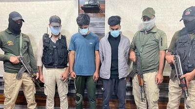 A joint team of Srinagar police and Rashtriya Rifles arrested two ‘hybrid’ terrorists and recovered 4 pistols, ammunition, 16 gelatin sticks and a grenade, police said (Twitter/SrinagarPolice) A joint team of Srinagar police and Rashtriya Rifles arrested two ‘hybrid’ terrorists and recovered 4 pistols, ammunition, 16 gelatin sticks and a grenade, police said (Twitter/SrinagarPolice)