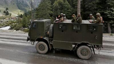 Indian army soldiers are seen atop a vehicle on a highway leading to Ladakh. (REUTERS) Indian army soldiers are seen atop a vehicle on a highway leading to Ladakh. (REUTERS)