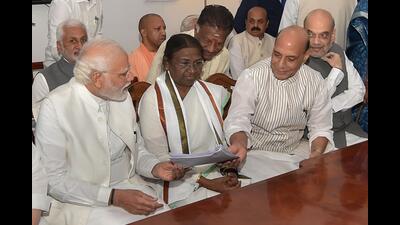 NDA candidate Droupadi Murmu files her nomination papers for presidential election in New Delhi on June 24. (PTI) NDA candidate Droupadi Murmu files her nomination papers for presidential election in New Delhi on June 24. (PTI)