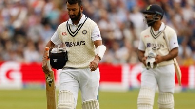 India's Cheteshwar Pujara walks after losing his wicket&nbsp; (Action Images via Reuters)