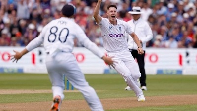 England's Matthew Potts celebrates after taking the wicket of India's Virat Kohli (Action Images via Reuters)