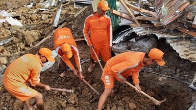 Members of National Disaster Response Force (NDRF) search for survivors after a landslide in Noney in the northeastern state of Manipur. ( REUTERS)