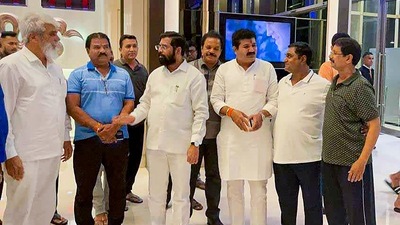 Guwahati: Rebel Shiv Sena MLA Eknath Shinde with Minister of Agriculture of Maharashtra Dadaji Dagadu Bhuse and other rebel MLAs at a hotel, in Guwahati, Thursday. (PTI) Guwahati: Rebel Shiv Sena MLA Eknath Shinde with Minister of Agriculture of Maharashtra Dadaji Dagadu Bhuse and other rebel MLAs at a hotel, in Guwahati, Thursday. (PTI)