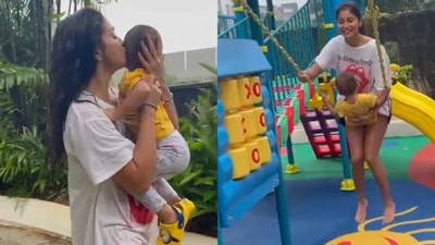 Shriya Saran playing with daughter Radha in the rain. Shriya Saran playing with daughter Radha in the rain.