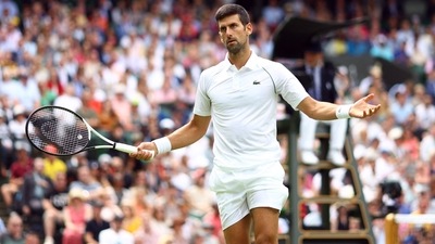 Serbia'a Novak Djokovic reacts during his second round match against Australia's Thanasi Kokkinakis (REUTERS)