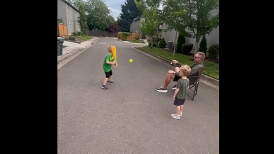 The image, taken from the viral Instagram video, shows the dad with his kids playing cricket. (Twitter/@DerekRadleyGolf)