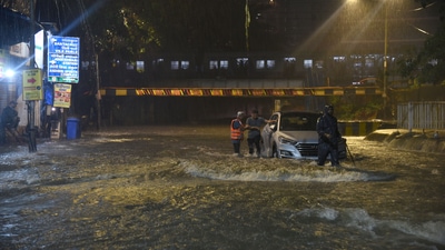 Mumbai, India - June 30, 2022: A car stops functioning on the waterlogged subway after heavy downpour of rain at Andheri, in Mumbai, India, on Thursday, June 30, 2022. (Photo by Vijay Bate/HT Photo) (HT PHOTO)