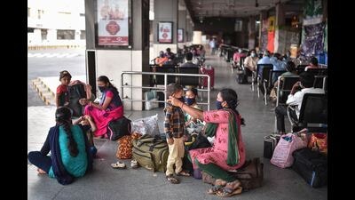 Vijayawada: Passengers wait to board APSRTC buses in Vijayawada. According to a notification from the APSRTC, the bus fares the bus fares remain unchanged for the first 30 km. (PTI) Vijayawada: Passengers wait to board APSRTC buses in Vijayawada. According to a notification from the APSRTC, the bus fares the bus fares remain unchanged for the first 30 km. (PTI)