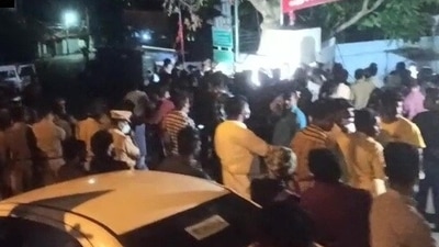 CPI (M) workers gather outside party headquarters after a bomb was hurled at the office late at night. (ANI) CPI (M) workers gather outside party headquarters after a bomb was hurled at the office late at night. (ANI)