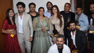 Harshad Chopra of Yeh Rishta Kya Kehlata Hai fame and Rupali Ganguly of Anupamaa fame attended the International Iconic Awards in Mumbai on Thursday. (Varinder Chawla) 