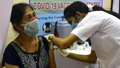 A beneficiary being inoculated with a Covid-19 vaccine (Image used only for representation) A beneficiary being inoculated with a Covid-19 vaccine (Image used only for representation)