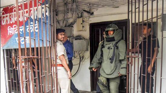 Bomb disposal personnel check after a crude bomb exploded inside the Civil Court premises, in Patna, Friday, July 01, 2022. A police officer who had brought the explosive for investigation purpose got injured in the explosion. (PTI Photo)