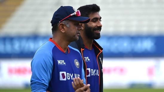 India's Jasprit Bumrah, right, and coach Rahul Dravid inspect the pitch during a training session ahead of the fifth cricket test match between England and India at Edgbaston in Birmingham.(AP)