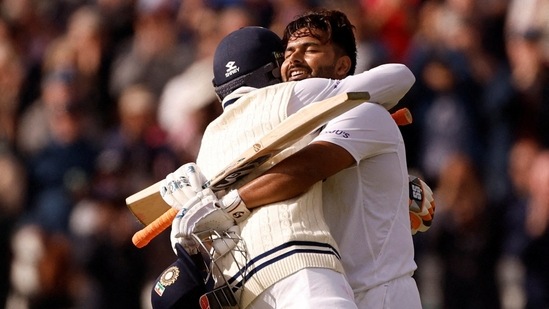 India's Rishabh Pant celebrates reaching his century with Ravindra Jadeja(Action Images via Reuters)