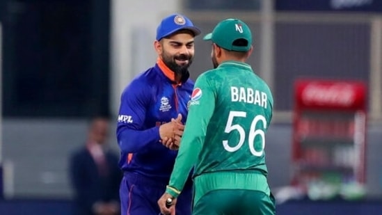 Virat Kohli (L) with Babar Azam(AP) Virat Kohli (L) with Babar Azam(AP)