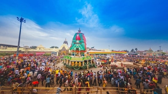 Ratha Yatra, also known as the Chariot Celebration of Lord Jagannath, Devi Subhadra, and Lord Balabhadra, is being observed today, July 1. It is the most prominent Hindu festival in the Puri city of Odisha. This festival takes place every year on the second day of the Shukla Paksha in the months of June or July. Around a million devotees from across the country thronged temple town of Puri on Friday to pull the three wooden chariots carrying Lord Jagannath and his siblings on the main thoroughfare.(HT Photo/Debabrata Mohanty)