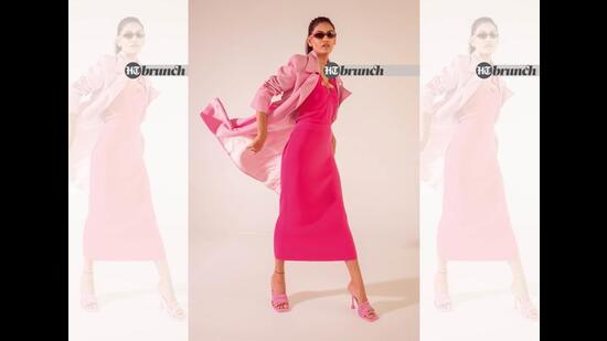 Go the maximalist way and make a statement by going hot pink head-to-toe; Coat by Rajesh Pratap Singh; Top, skirt and shoes by Zara; Sunglasses by Prada (Vidushi Gupta)