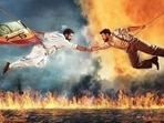 Jr NTR and Ram Charan in a still from RRR. Jr NTR and Ram Charan in a still from RRR.