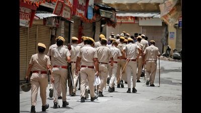 Police personnel patrol an area in Udaipur, on Saturday. (REUTERS) Police personnel patrol an area in Udaipur, on Saturday. (REUTERS)